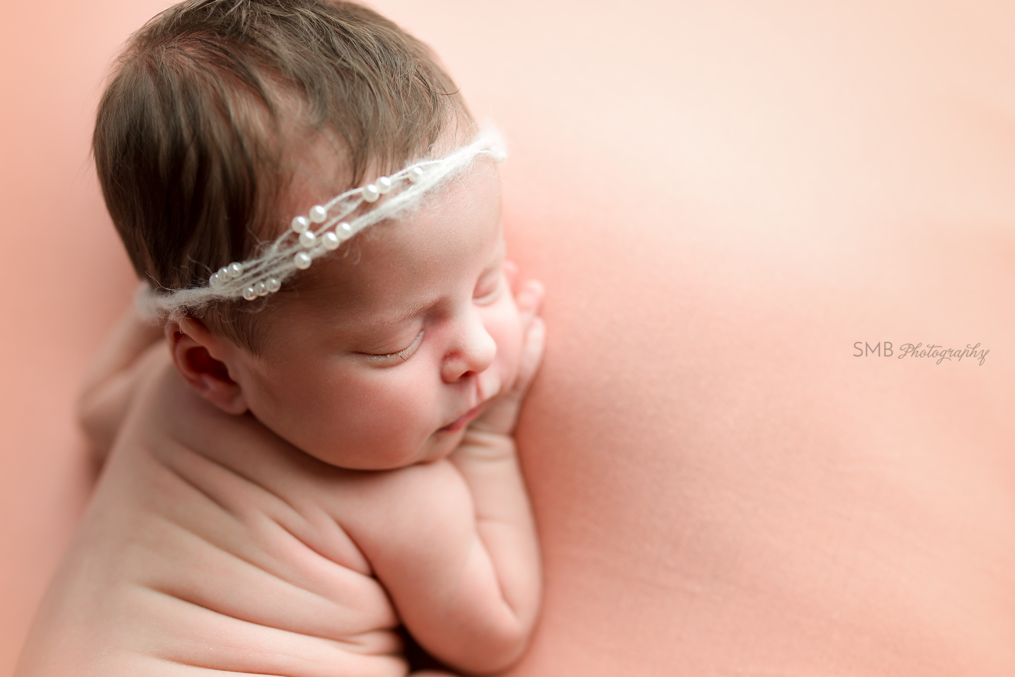 Profile portrait of newborn face