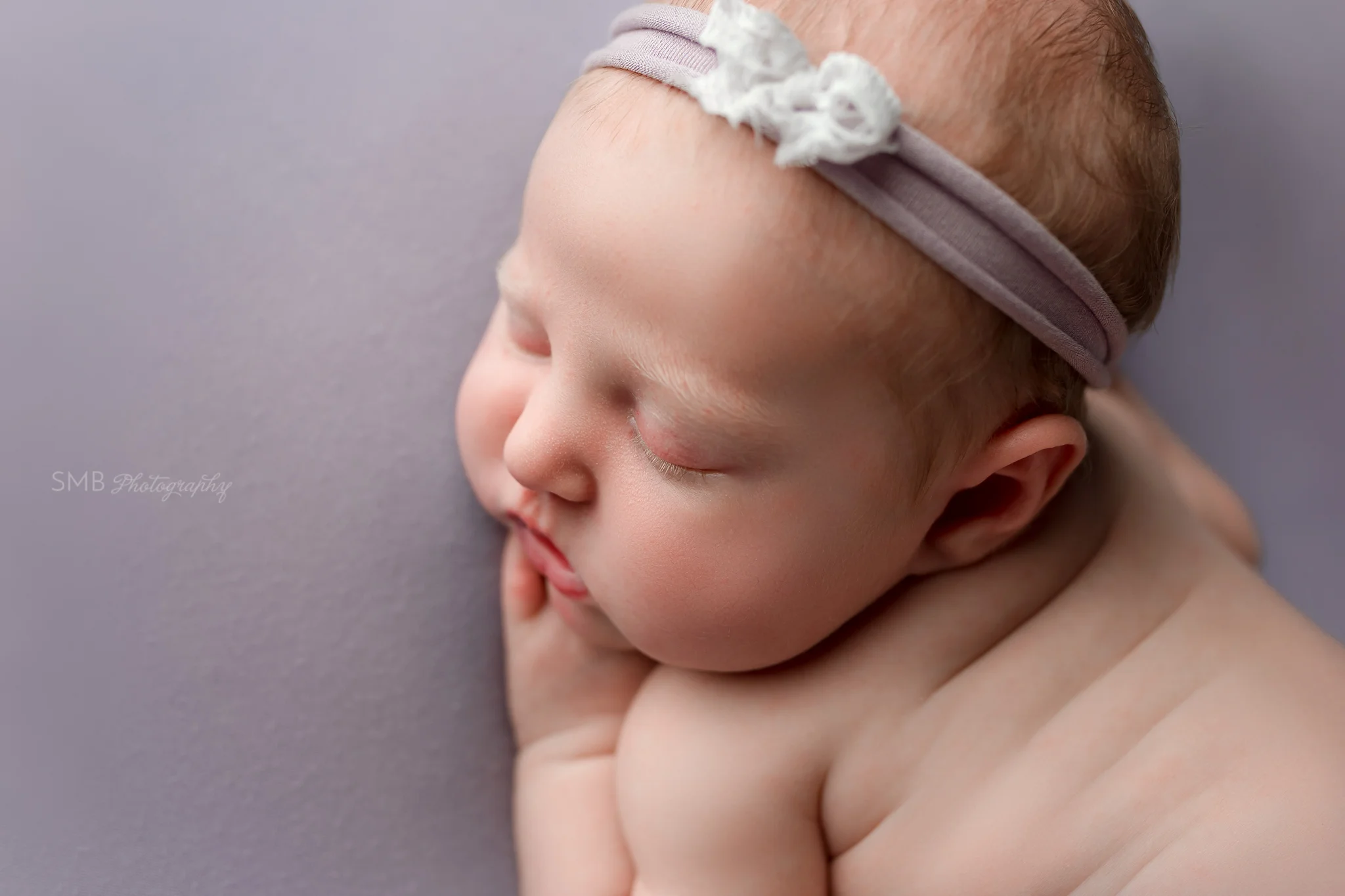Profile image of newborn face
