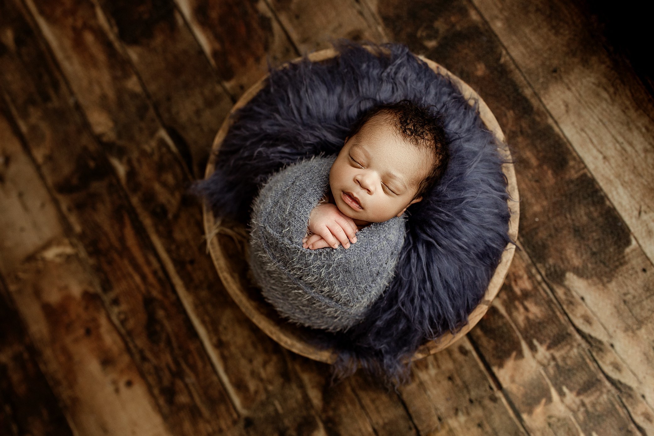 Baby boy wrapped in blue