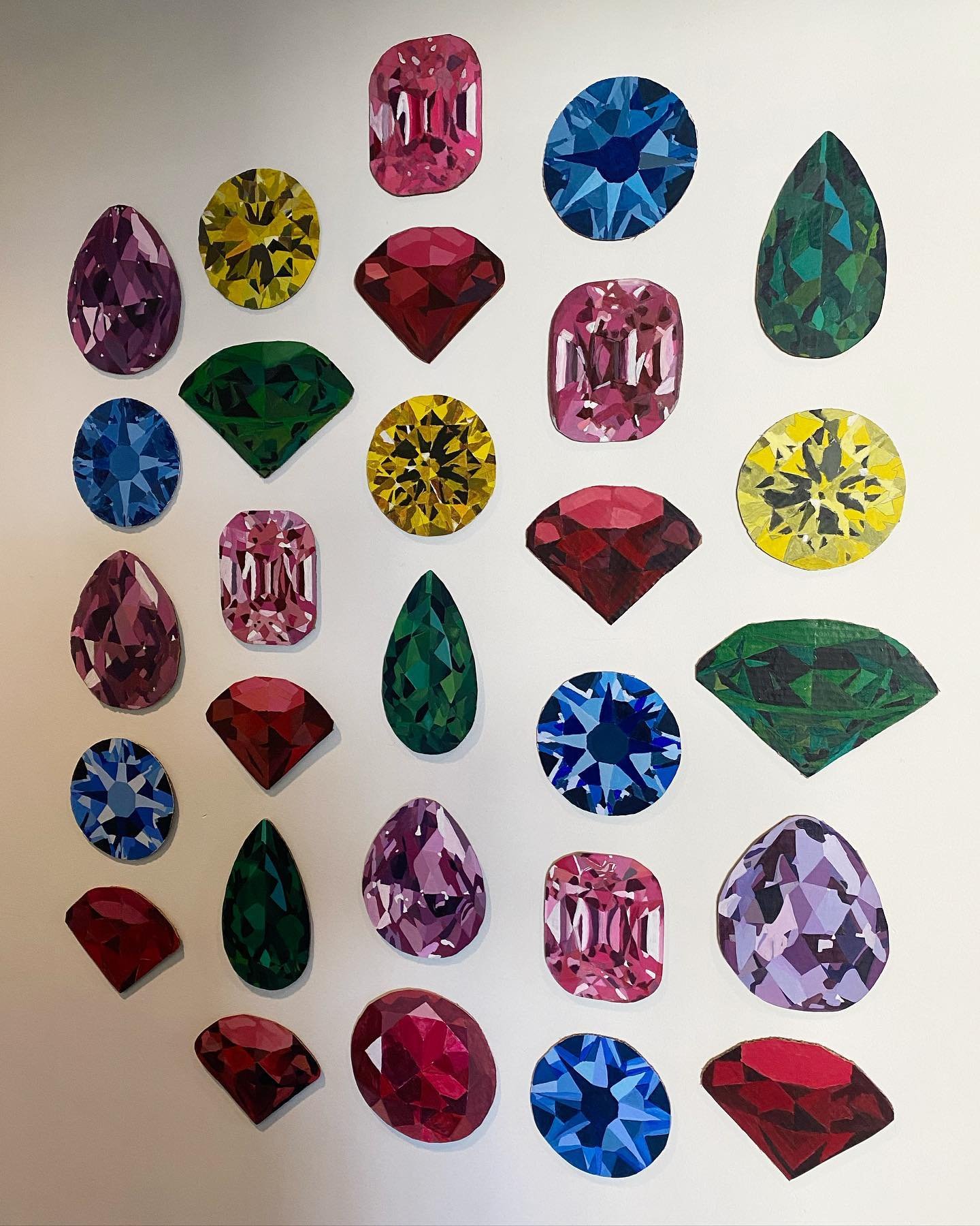 MULTIfaceted gemstones from Art Foundations I-Studio Art. In preparation for a self portrait painting, students learned about color theory, color mixing and color harmonies and executed their knowledge through a monochromatic gemstone painting. Worki