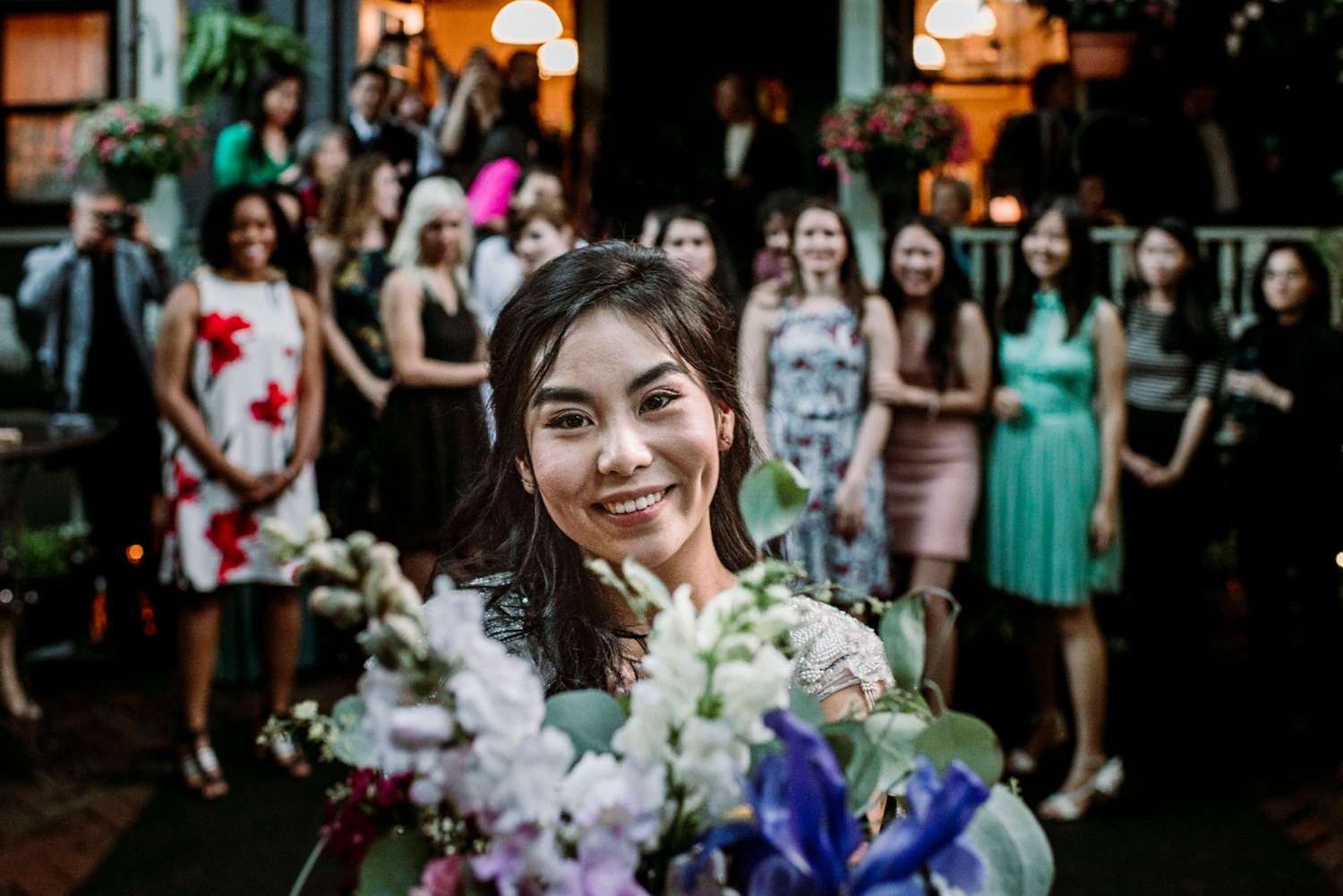 bride tossing bouquet