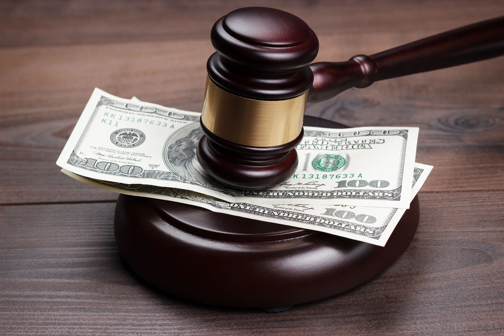 bigstock-judge-gavel-and-money-on-brown-44019925.jpg
