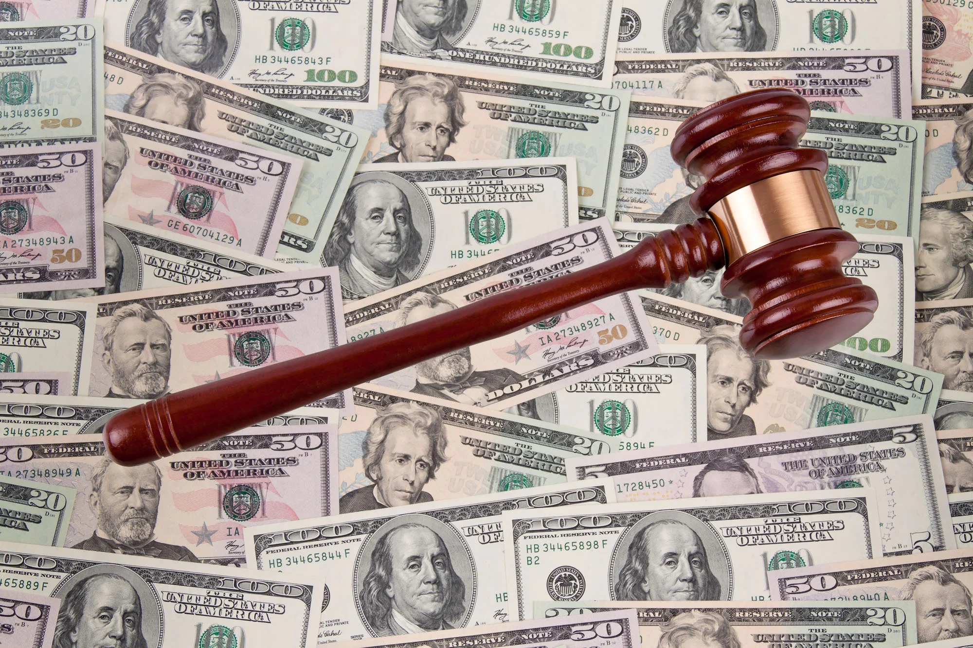 bigstock-Dollar-Currency-notes-with-gav-14597465.jpg