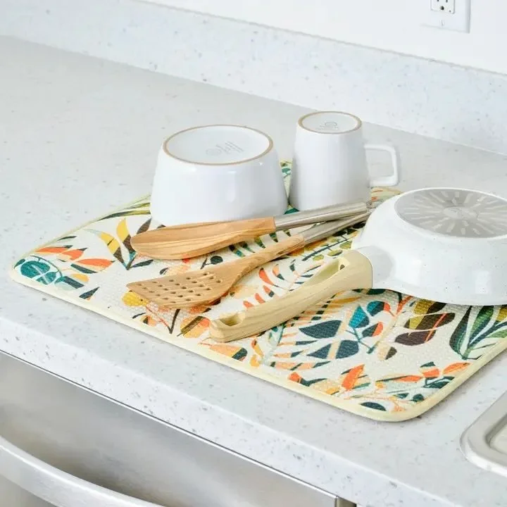 Discover our ultra-absorbent drying mats, designed to keep your kitchen counters dry and spotless. Available in convenient single or double packs, these mats feature vibrant patterns and colors that add a stylish touch to any kitchen. Perfect for dry