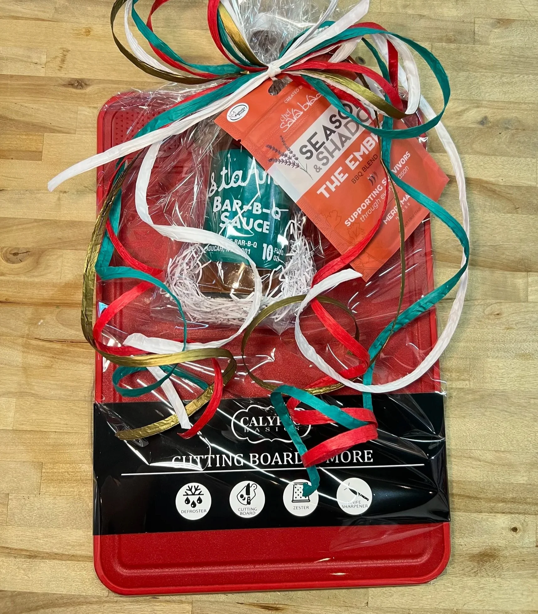 KITCHEN MVP
$46.00

A practical kitchen favorite packed with bold Kentucky flavor.

Includes:
&bull; Calypso Red Cutting Board with built-in defroster, zester, and knife sharpener
&bull; Starnes BBQ Sauce
&bull; Season &amp; Shadow BBQ Blend

Perfect