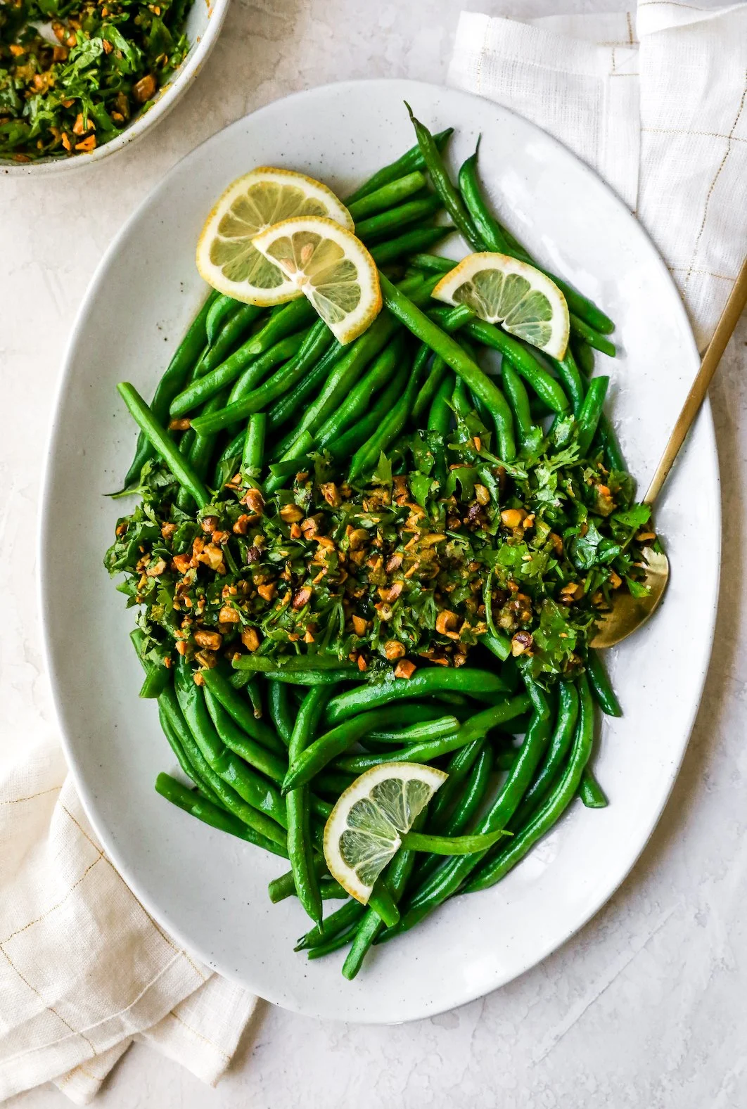 #13 EMBERED GREEN BEANS & PEAS WITH AVOCADO PISTACHIO CRUNCH