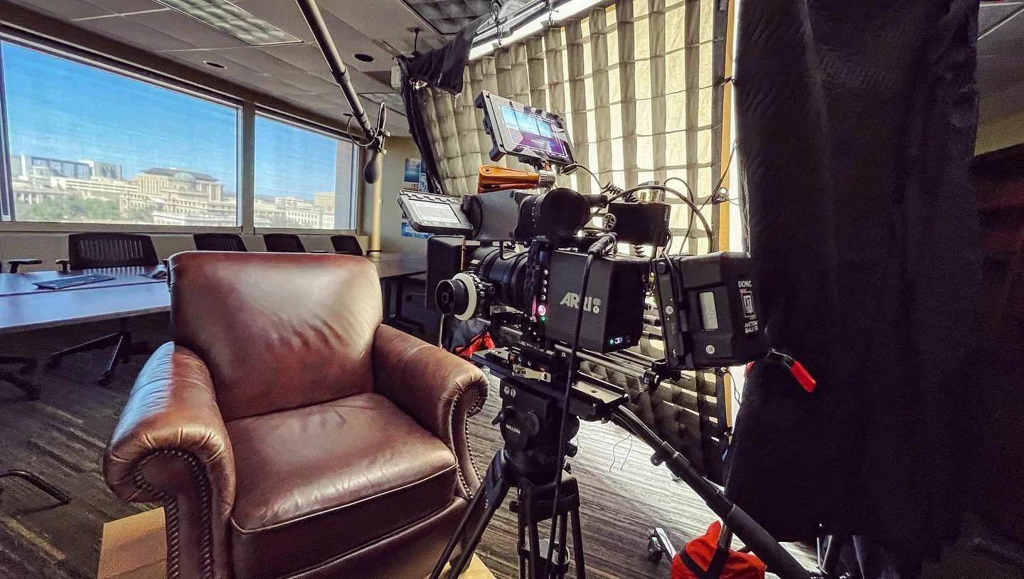 Shot on ARRI Alexa Mini with ARRI Signature Prime lenses. 

Lit by two Aputure 600d lights shooting through two layers of unbleached muslin diffusion with a 45&deg; grid. Aputure 300d spotlight mount casting vertical streak of light on back wall.

We