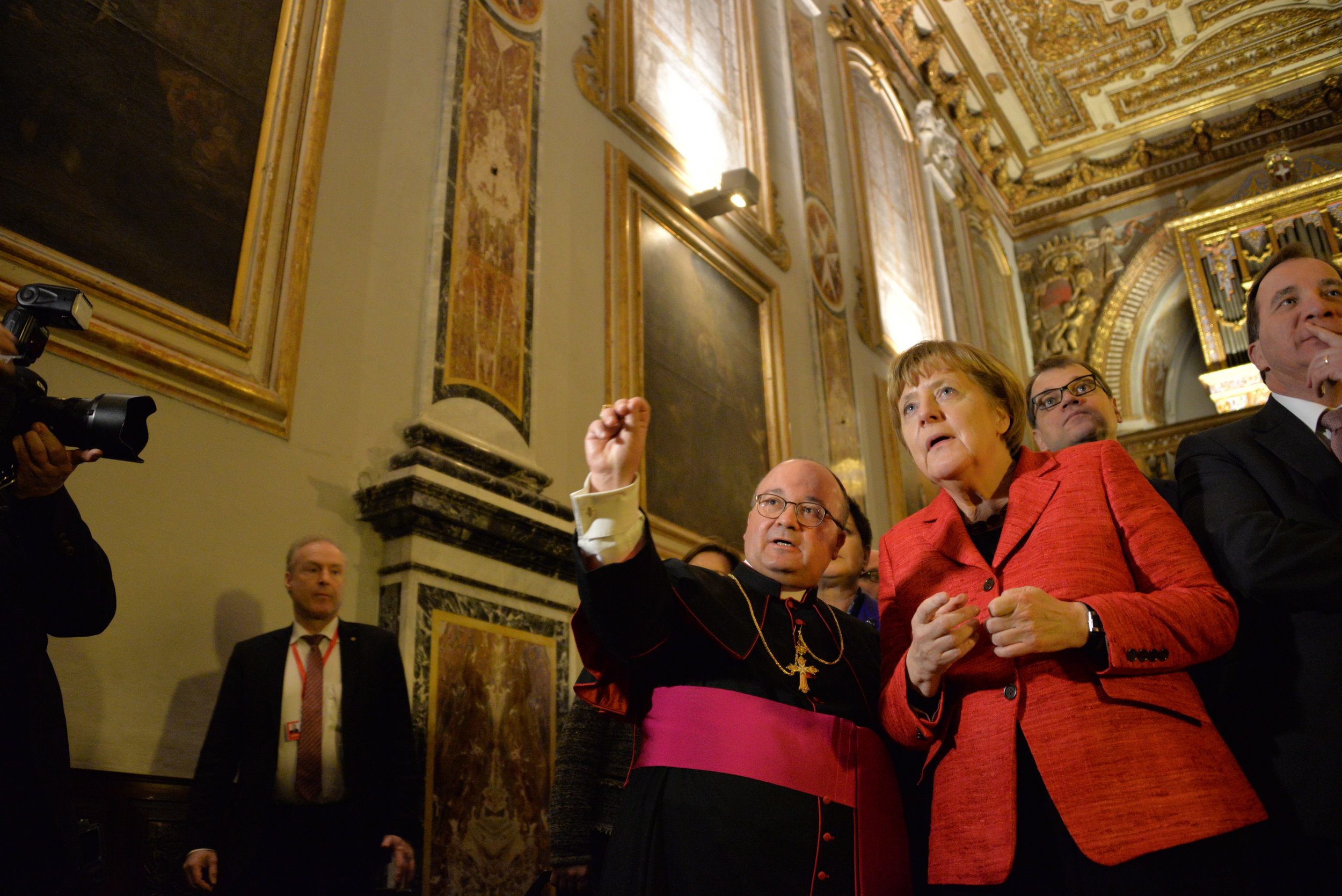  Angela Merkel and Members of the  European Council tour St. John's Church in Valletta, Malta, Friday, Feb. 3, 2017. A continued flow of migrants from the Middle East and Africa is pressuring the European Council to act with some calling for cooperat