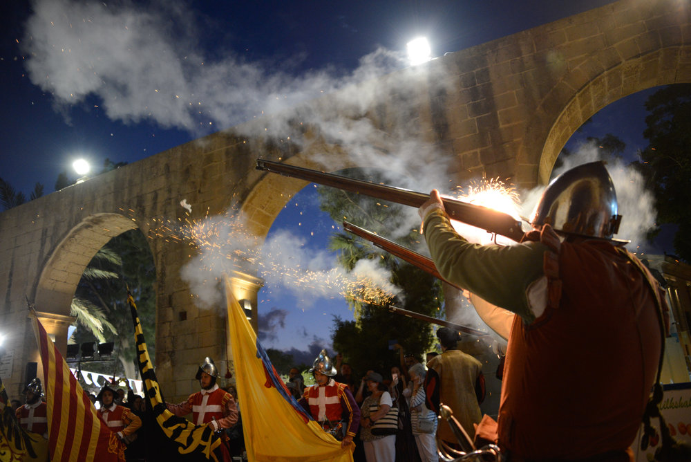  A re-enactment of a gun salute by The Knights of Malta kick off the festivities at Upper Barrakka Gardens. Prior to independence in 1963, Malta was ruled by many different empires - Greeks, Roman, French, British - but none are more cherished in Mal