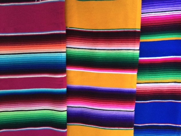 Mexican blankets. Pink, yellow, blue.