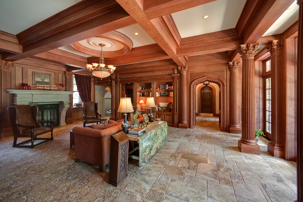   The Library. &nbsp; A labor of love, with hand-carved and hand-rubbed moldings, deeply fluted columns, coffered ceilings, antique onyx lighting and high ceilings. 