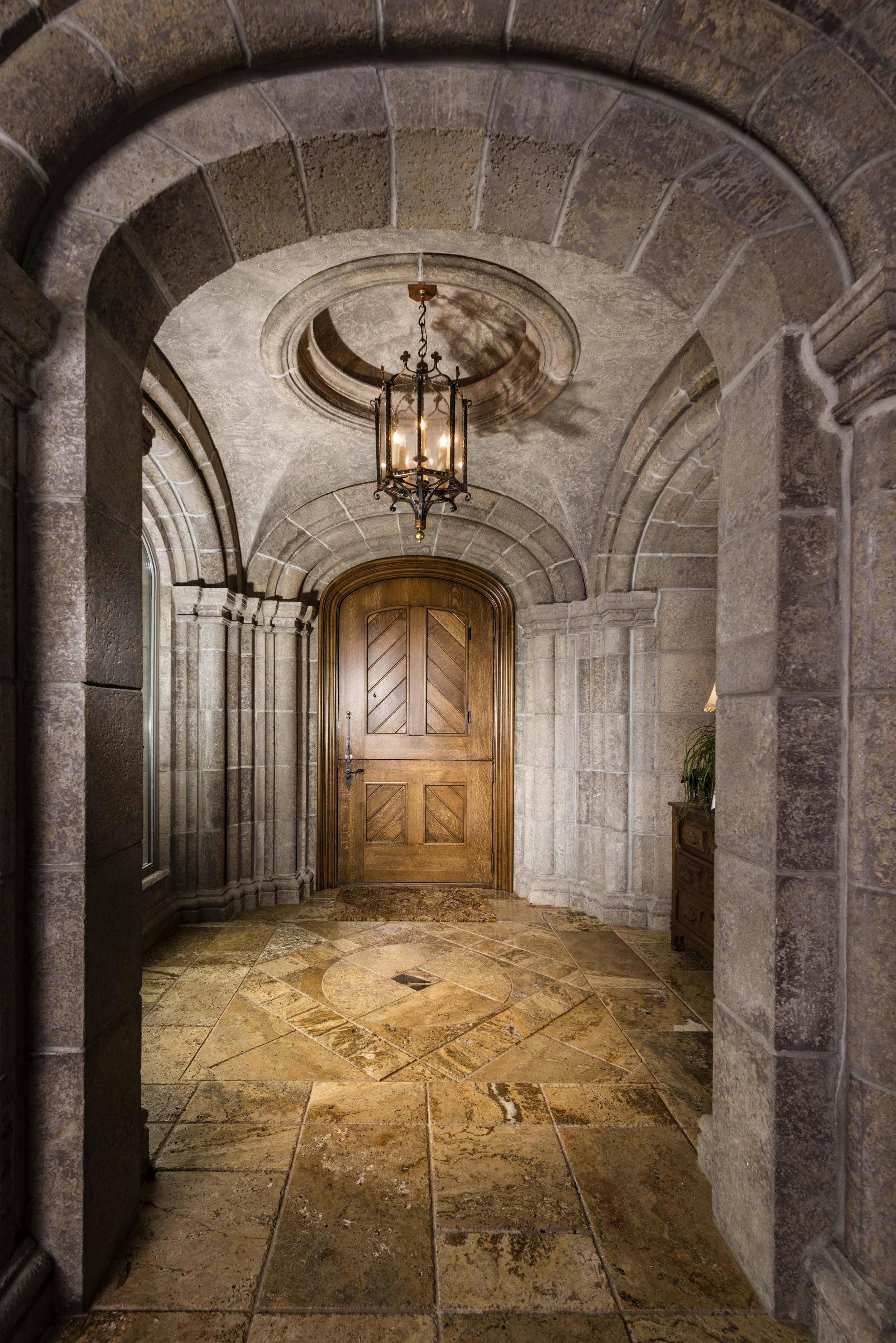 Groin vault entry foyer with front door.