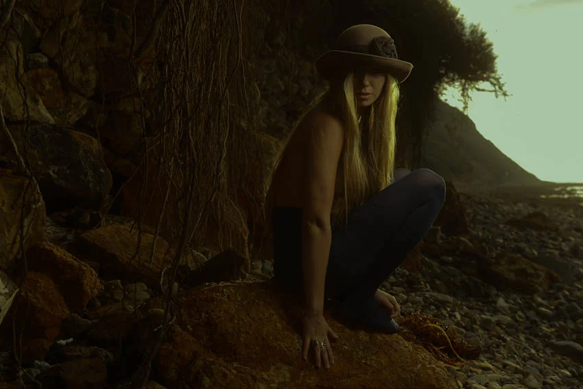Roots coming out of the cliff. I was thinking I might do something dark.