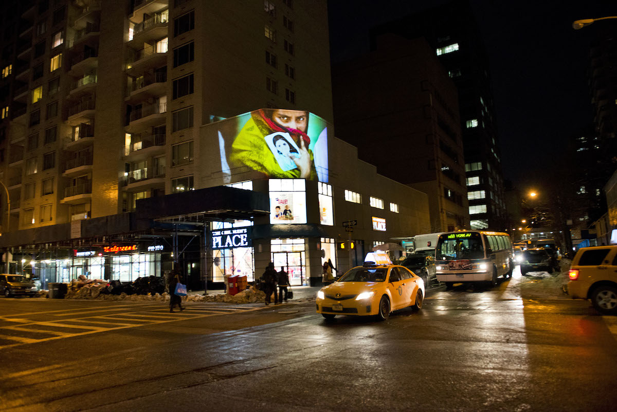 Photo from Rana Plaza collapse on the wall of Children's Place in NYC. Photo: Ismail Ferdous 