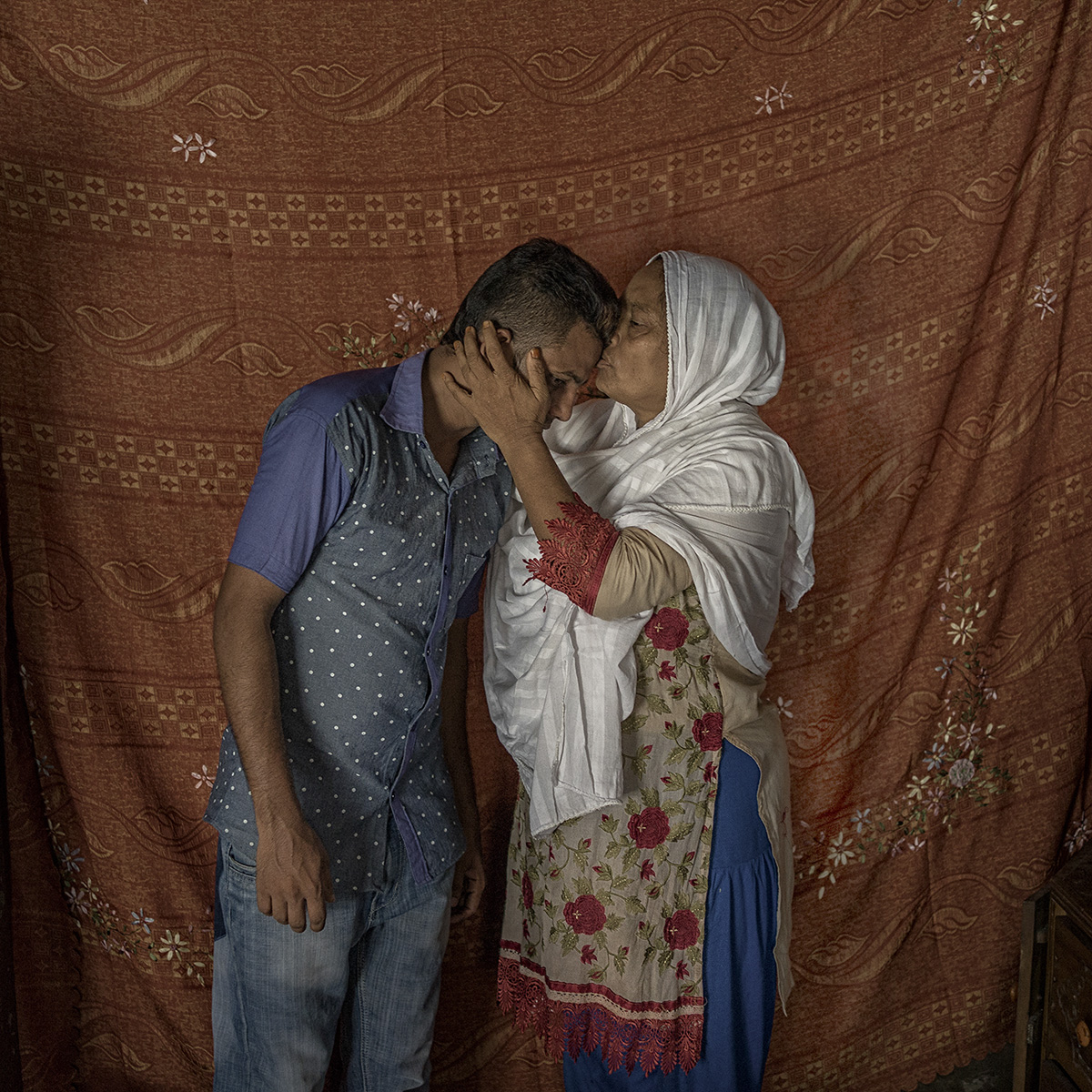 Shobuj Hosain Ridoy (23) with his mother. He was a volunteer during the Rana Plaza Collapse. “We heard the story about liberation war about many dead people, But didn’t ever see with own eyes. But when Rana Plaza collapsed, we felt like we came into a war zone. I feel proud to take part in this battle.” His mother said.