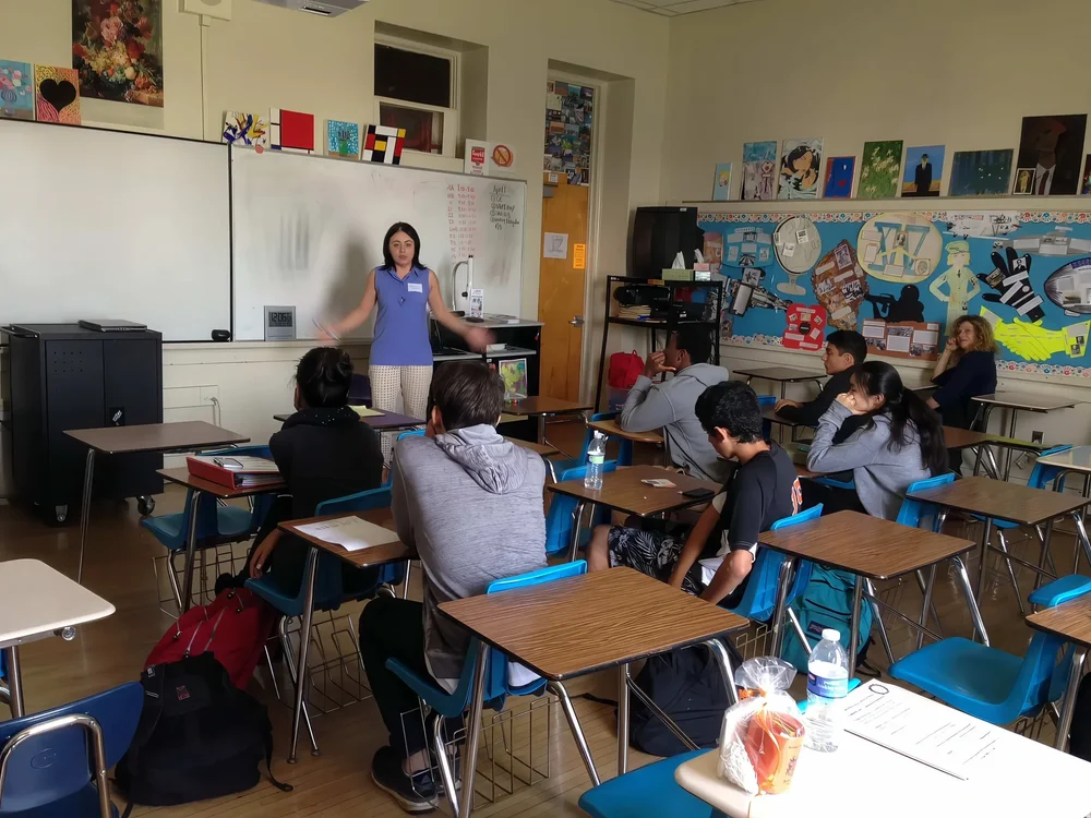 Irina Popa-Erwin speaking to students during Career Day at Beverly Hills High School