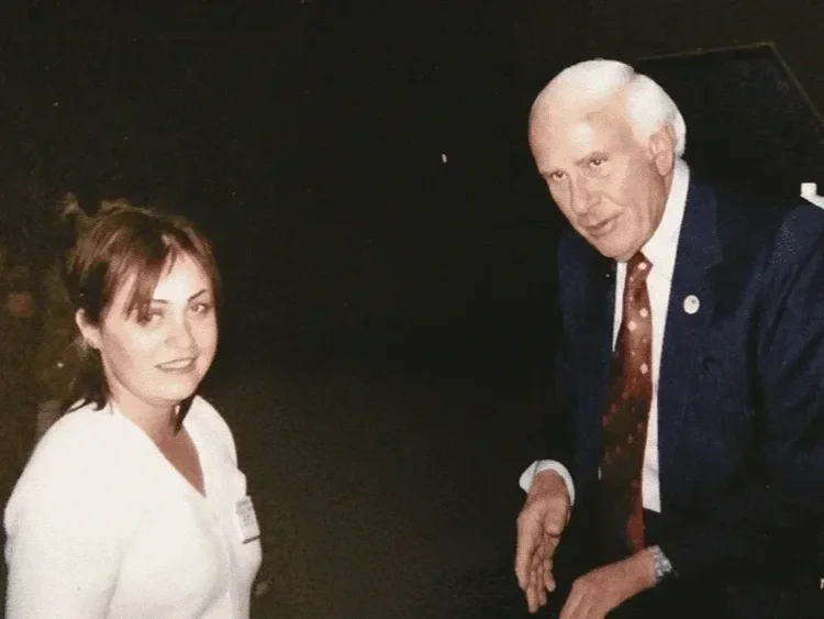 Irina Popa-Erwin with her mentor Jim Rohn at a leadership development event