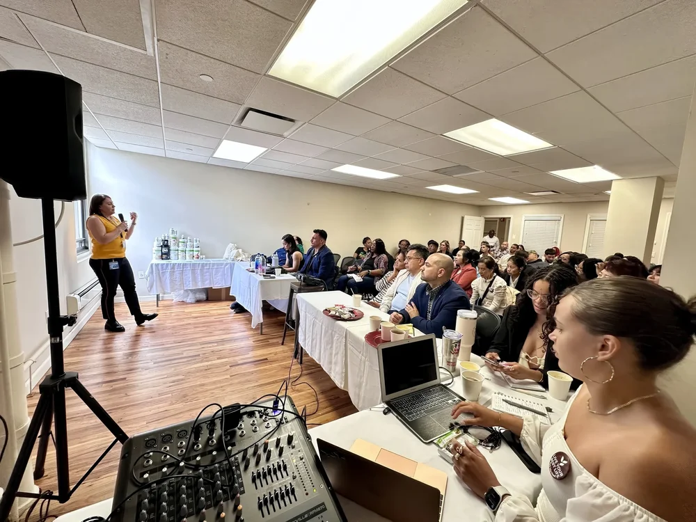 Leadership coach Irina Popa-Erwin delivering a corporate coaching presentation in New York City
