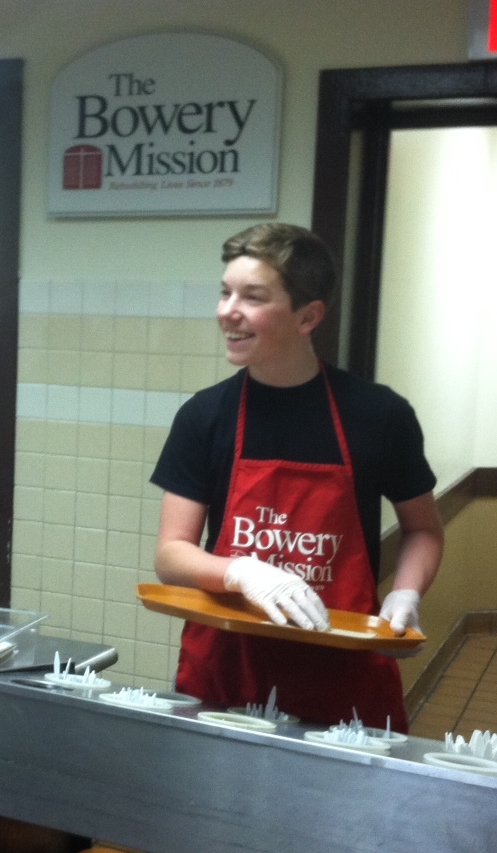 Xavier Moll, an eighth grader from our East Side location, serving at the Bowery Mission.
