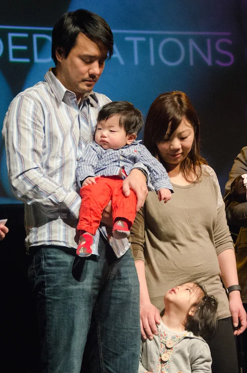 Ari Hwang, born March 6, 2015, with big sister Ava and parents Charles and Liz