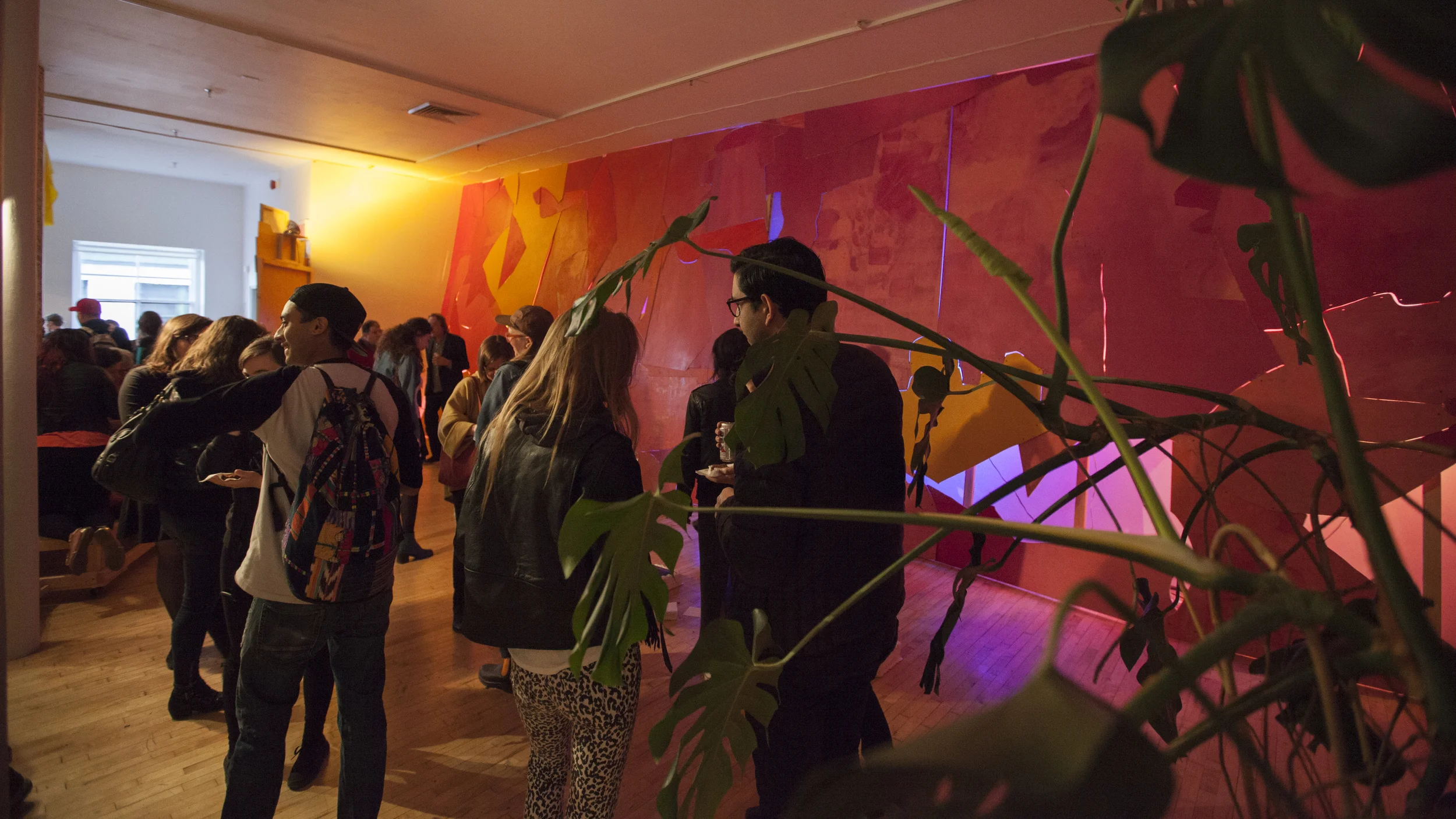 Lisi Raskin’s Flat Screen (Pink Wall) lights up the room at the opening of the group show you know it when you feel it as part of Lisi Raskin’s Recuperative Tactics , Art in General, April 19, 2014. Image credit: Steven Probert