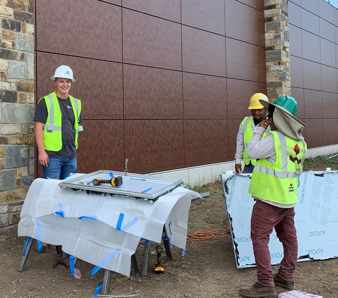 Jared Kerr taking a break from installing windows.