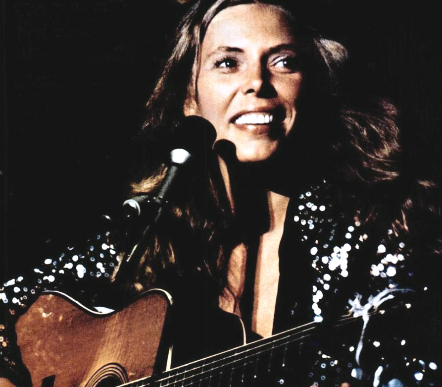 Joni Mitchel publicity photo, 1974. Image Credit: Wikimedia Commons .