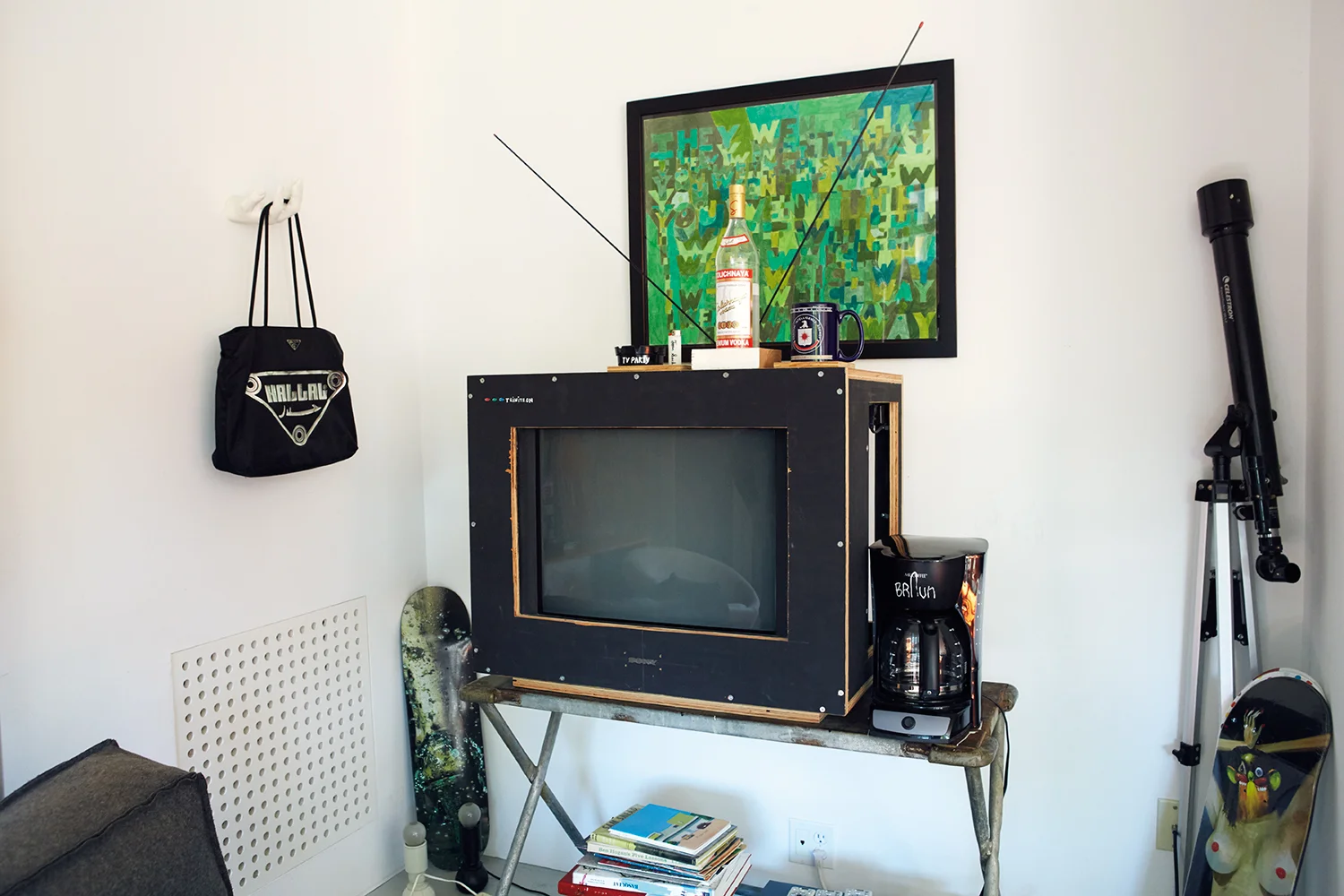 Left to Right: The Sweat Shop bag, by Kader Attia, TV Party , ‘14 by Tom Sacks.