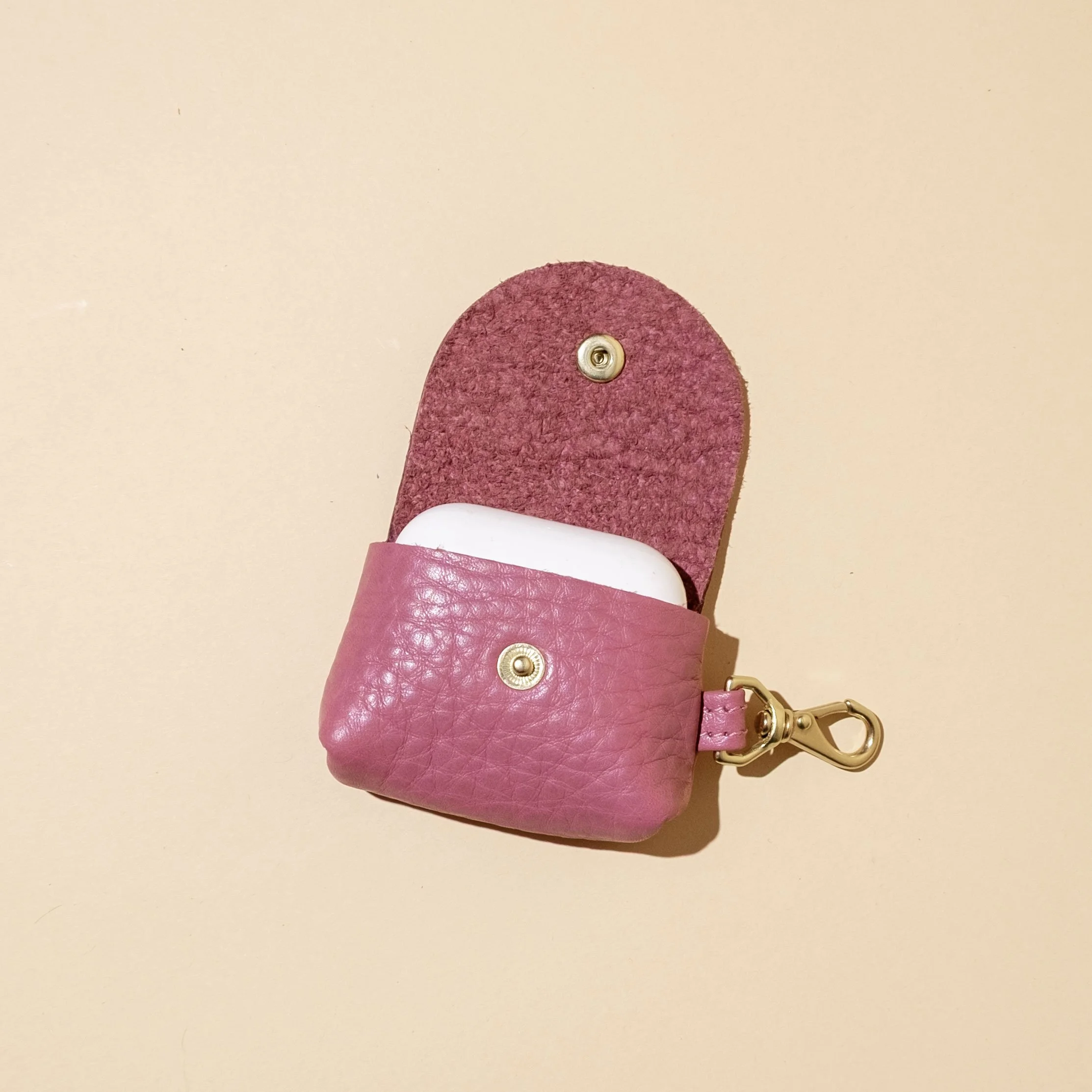 rose-leather-airpod-open.jpg