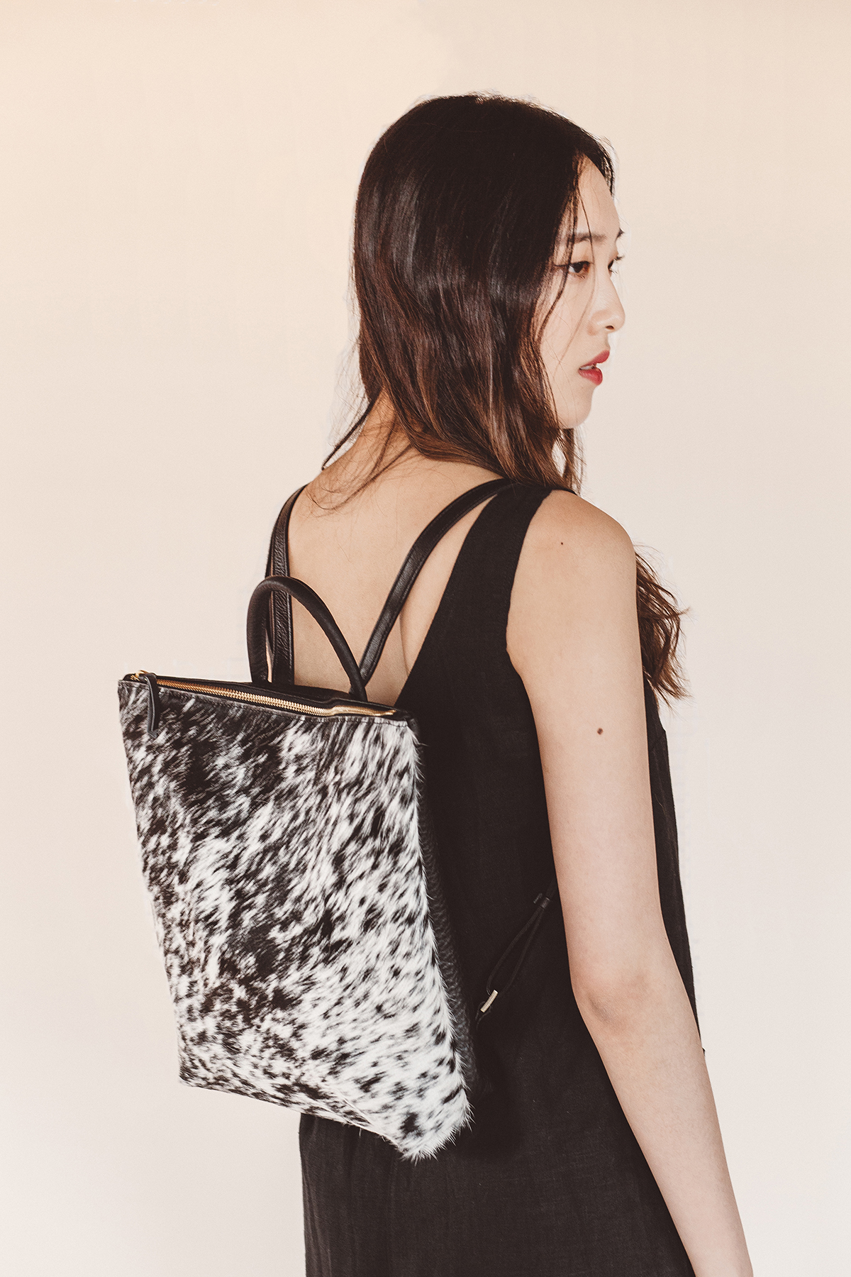 checkered leather backpack