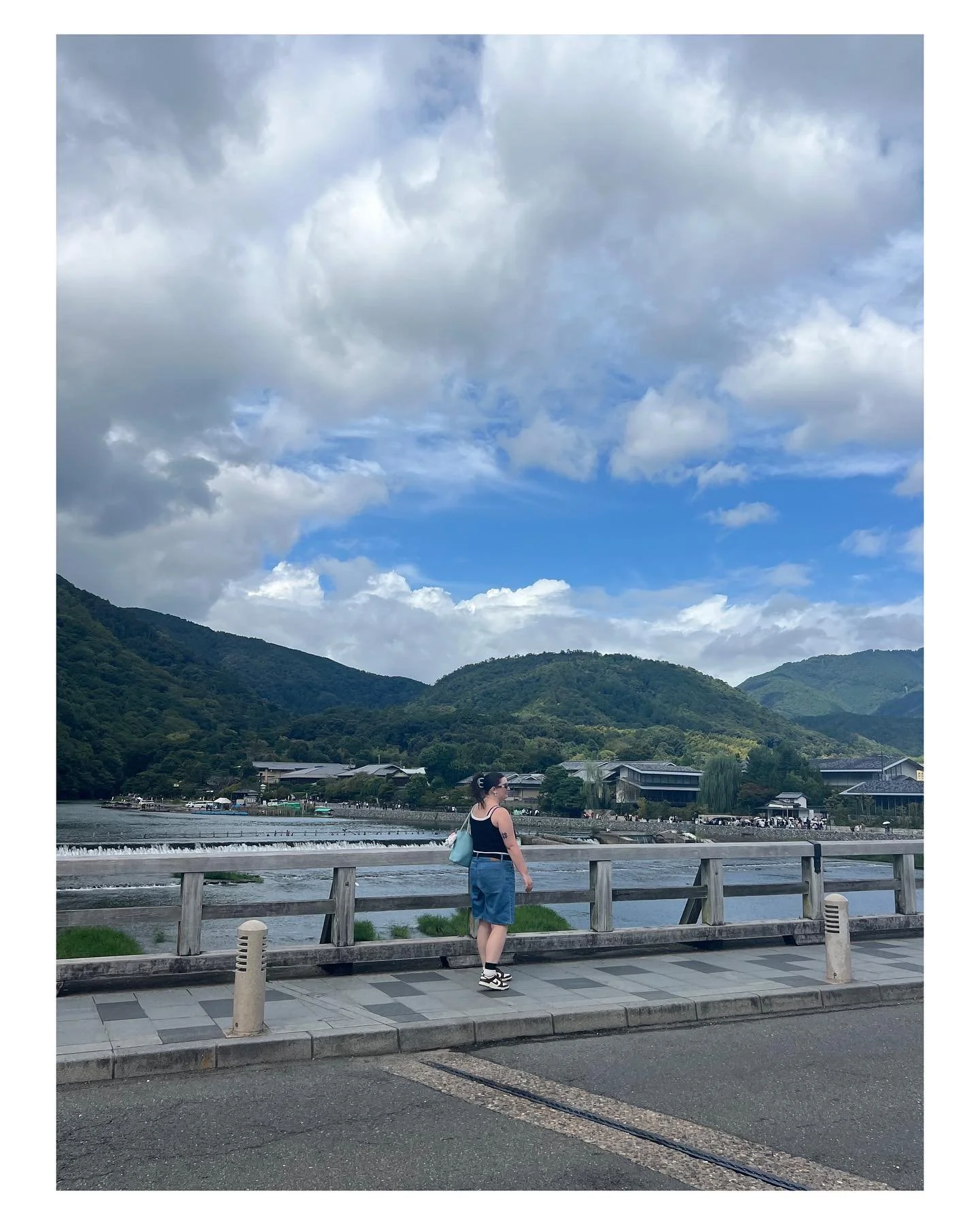 Haley running around Japan with her Robin Tiny Tote (and lots of different keychains) 🫶