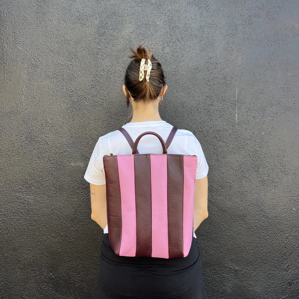 black leather backpack with pink with stipes PRIMECUT: SORBET STRIPES LEATHER BACKPACK