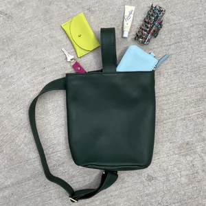 PRIMECUT: TAN CHECKERED LEATHER SLING BAG