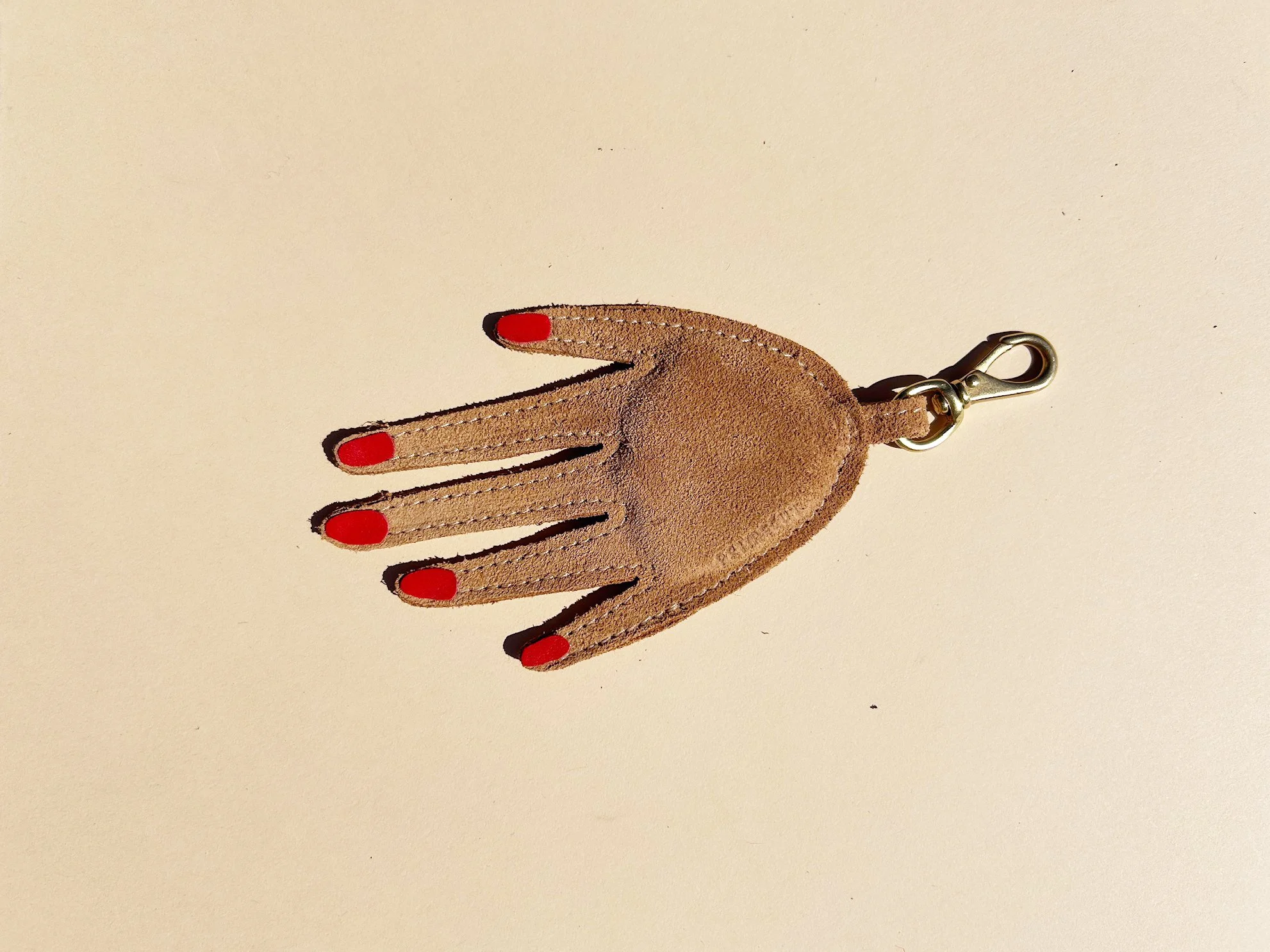 tan-hand-keychain-2 copy.jpg