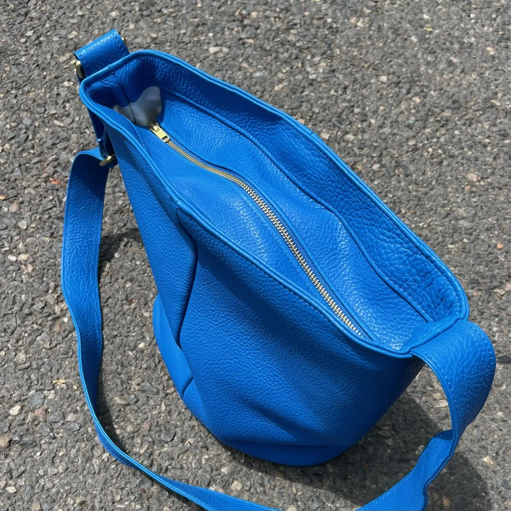 PRIMECUT: BRINDLE COWHIDE BUCKET BAG