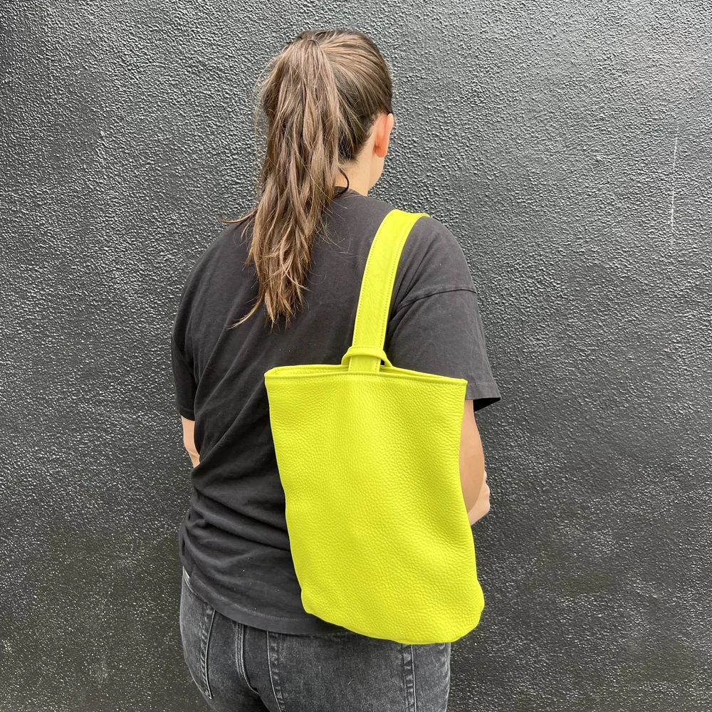 chartreuse leather backpack PRIMECUT: CHARTREUSE LEATHER SLING BAG