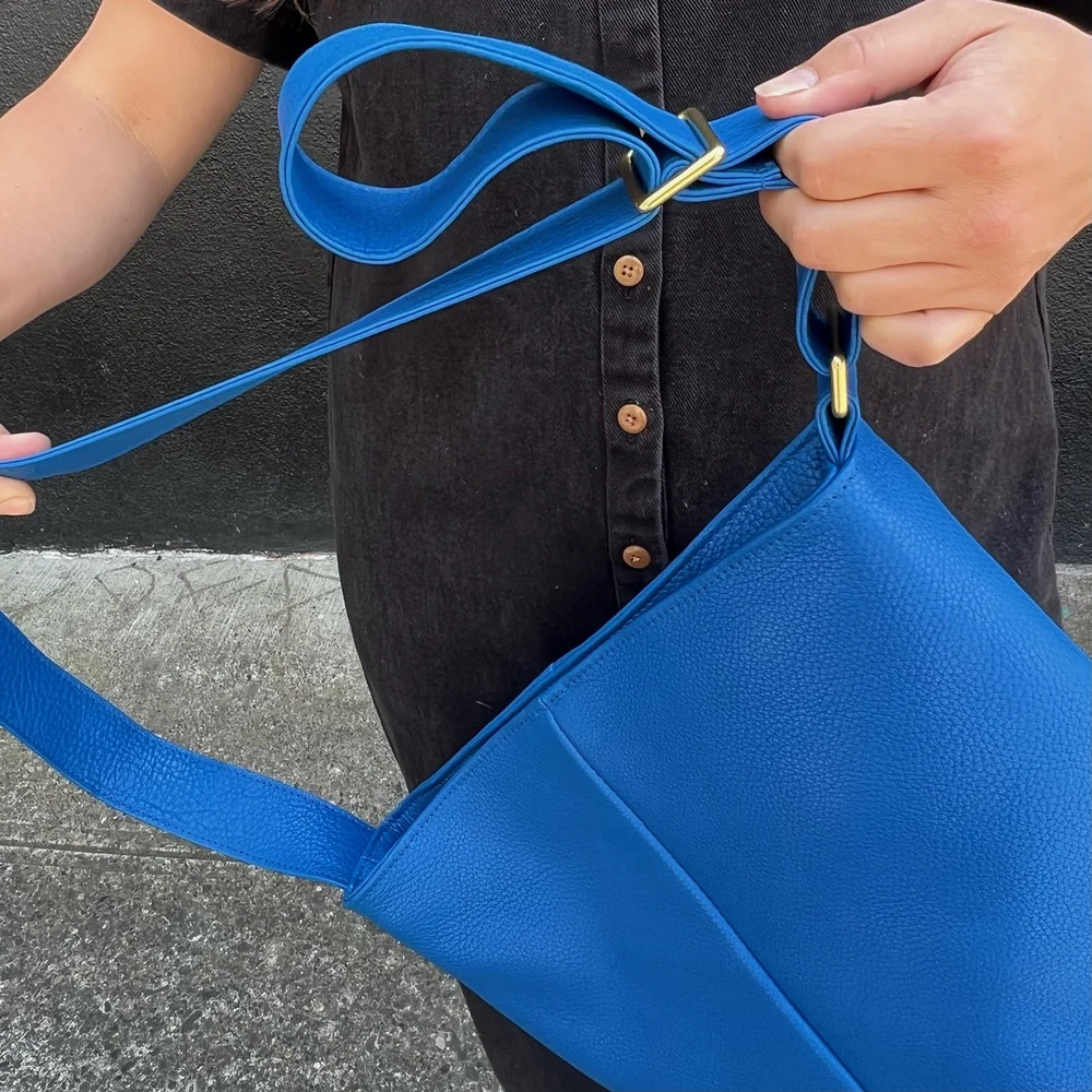 PRIMECUT: BRINDLE COWHIDE BUCKET BAG