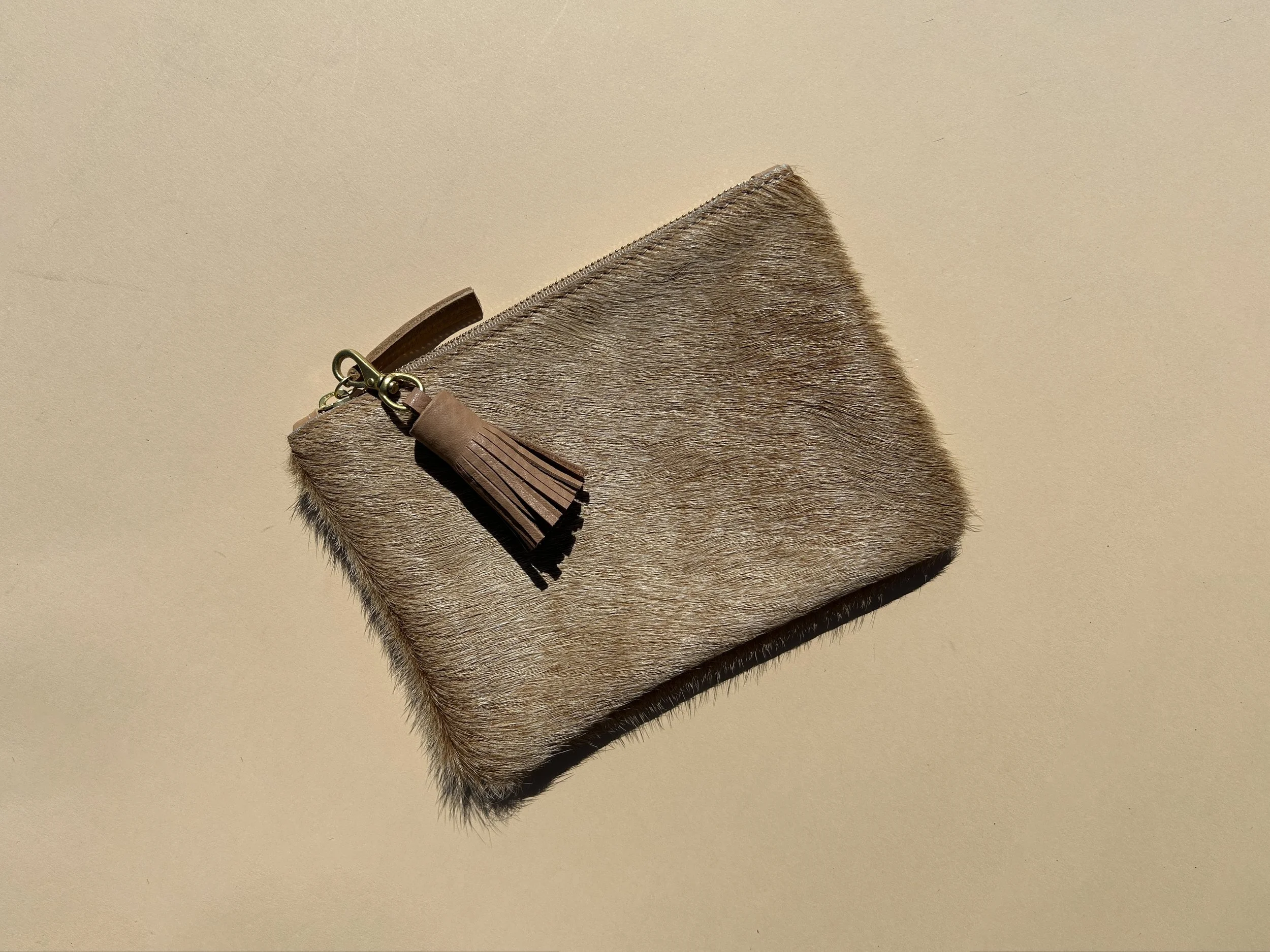 tan-tassel-pouch.jpg