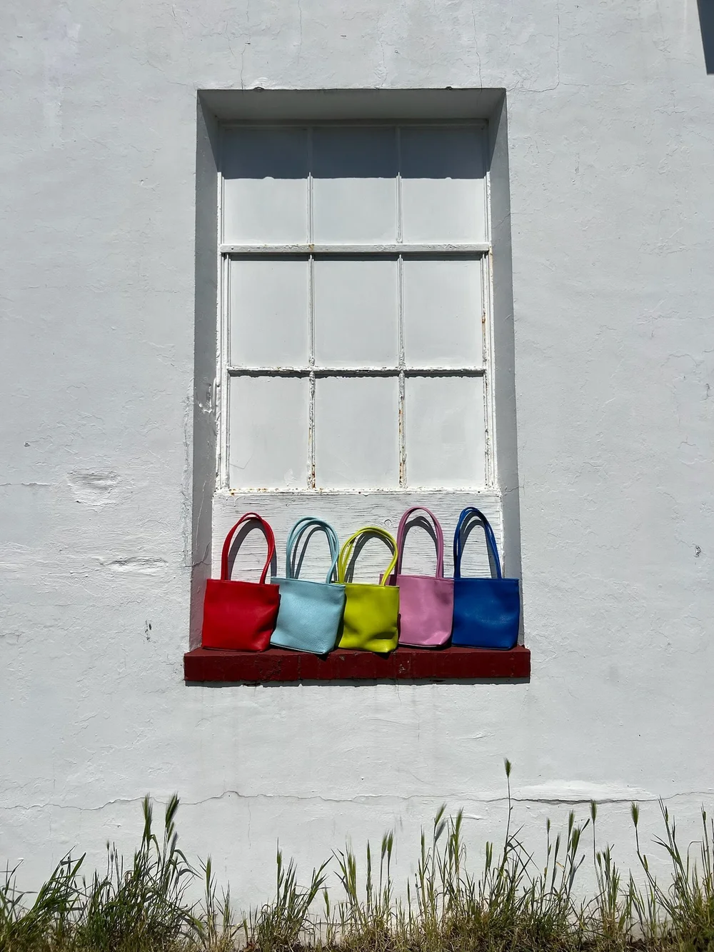 PRIMECUT: TOMATO LEATHER TINY TOTE