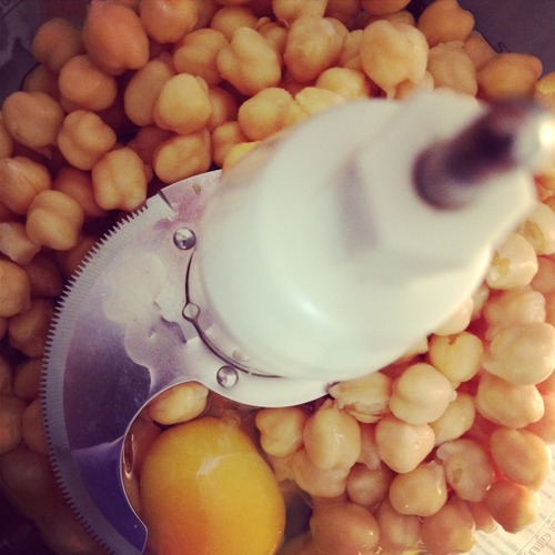 2 eggs and a can of chickpeas get pulsed until smooth.