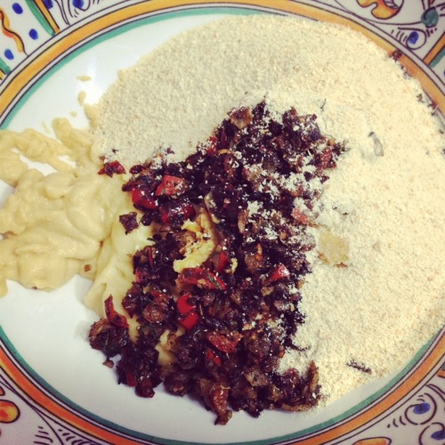 On a plate, combine the amazing “what-could-have-been-an-omelet ingredients” with the creamy chickpeas, and a cup of breadcrumbs.
