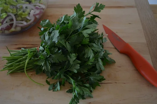 A cup of chopped parsley.