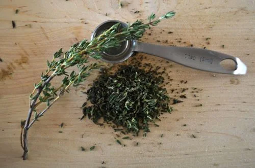 Finely chop some thyme; this is what fresh thyme looks like.