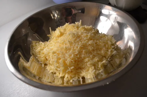 Dump it all on top of your cheesy milky spice mixture.