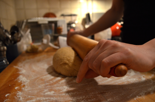 Laura began rolling the dough into a 20x12 inch rectangle.