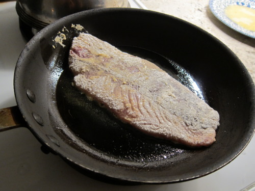 Into the olive oily (super hot) pan. Let it cook for 3 or so minutes.