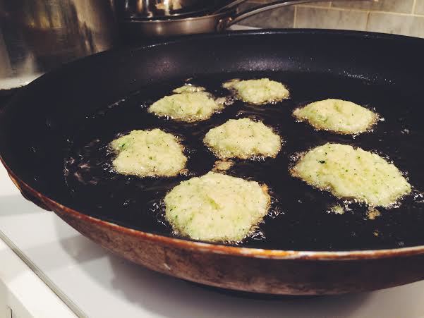 Hot canola oil, start frying by the tablespoon. Flatten with a spatula. 