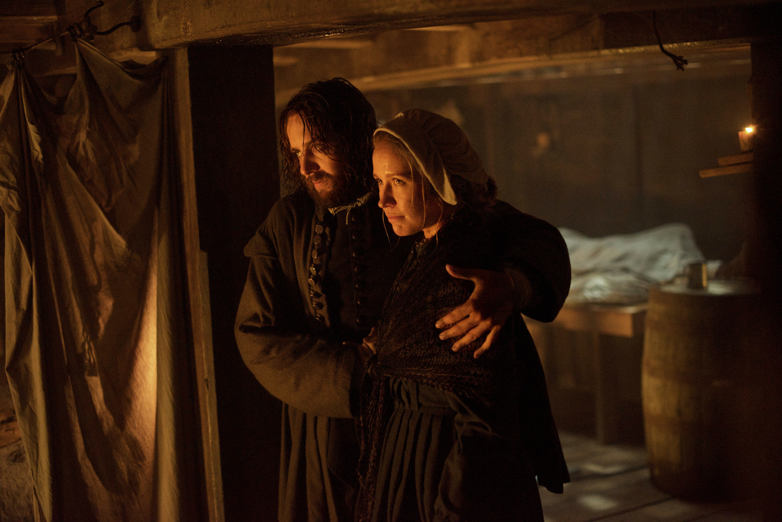 Vincent Kartheiser as William Bradford, left, and Anna Camp as his wife Dorothy Bradford in National Geographic Channel’s two-night movie event “Saints & Strangers,” premiering Nov. 22-23, 9/8c.
(photo credit: National Geographic Channels/David Bl