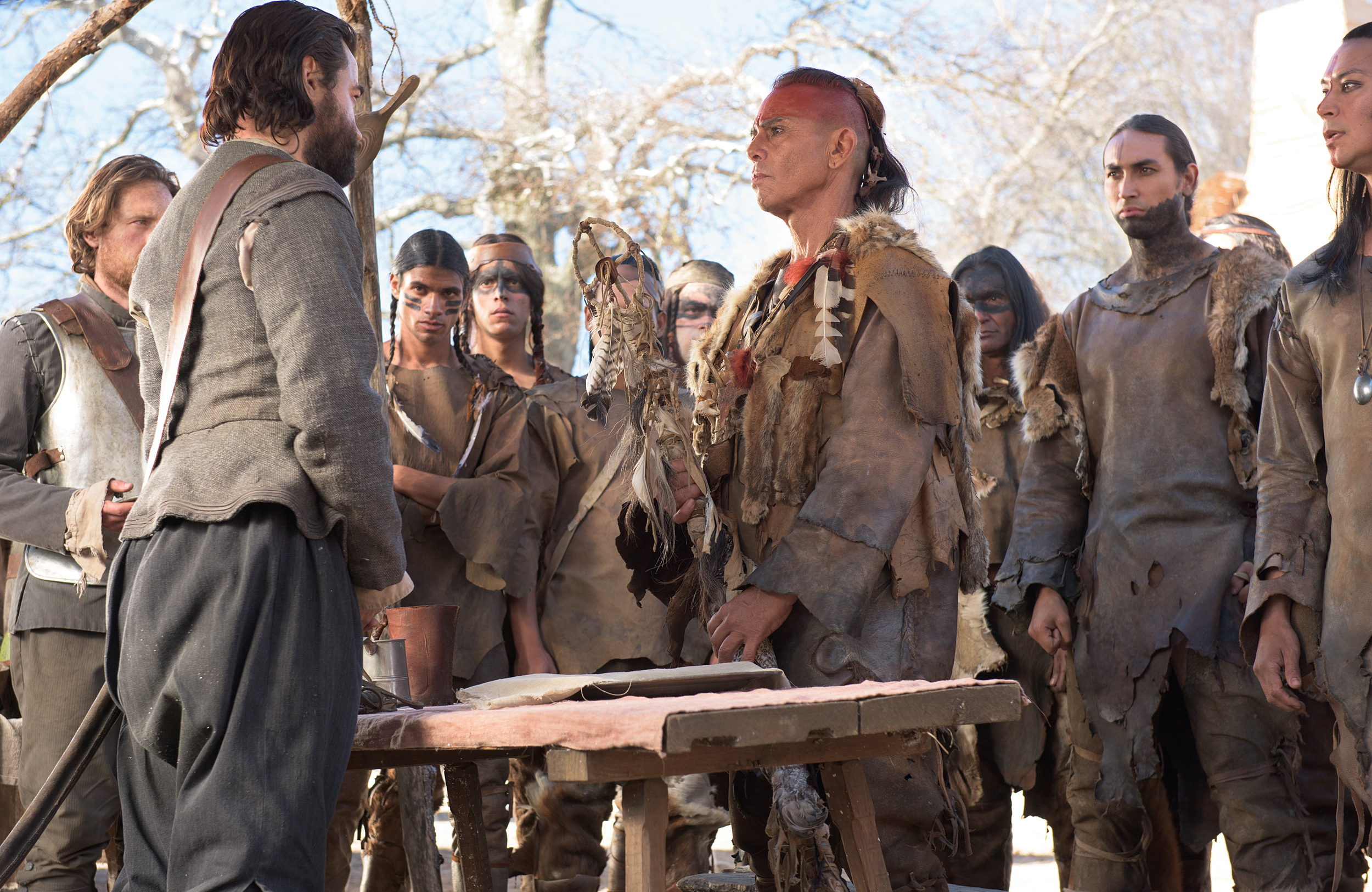 Ron Livingston as John Carver, left, talks with Raoul Trujillo as Massasoit in National Geographic Channel’s two-night movie event “Saints & Strangers,” premiering Nov. 22-23, 9/8c.
(photo credit: National Geographic Channels/David Bloomer)