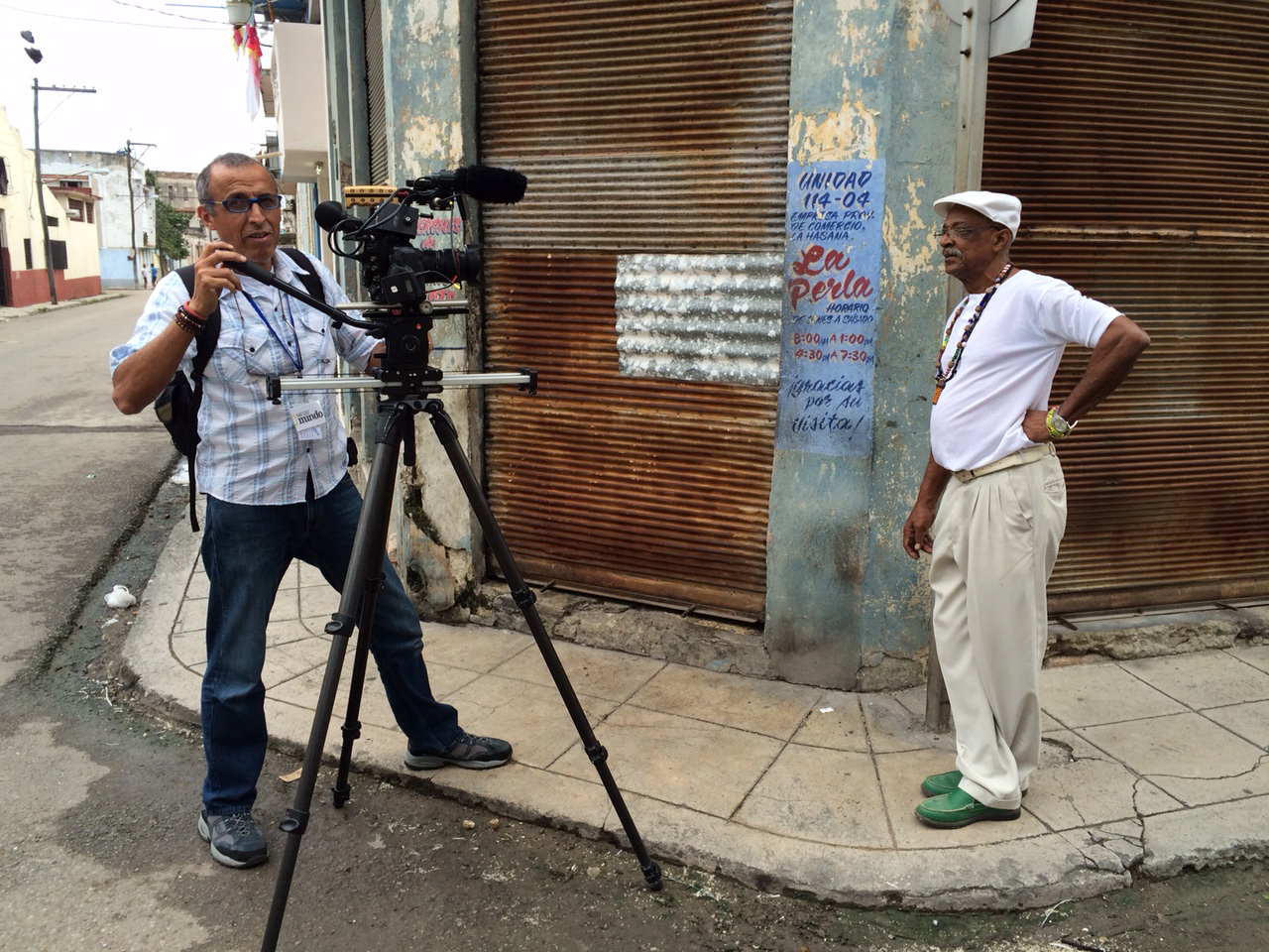  CUBA- The camera operator filmed b-roll of Julio Abreu Abreu, Babalawo, while he rested on a pole.

El operador de cámara filmó vídeo de archivo de Julio Abreu Abreu, Babalawo, mientras descansaba en un poste.
(Photo Credit: National Geographic Chan